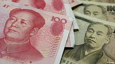 Банк БРИКС выдаст первый кредит в юанях