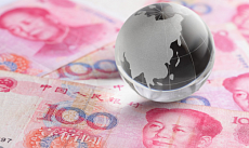 Доля китайского юаня в международных расчетах выросла в августе